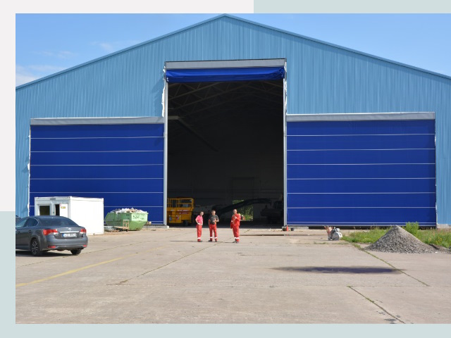 Ангарные ворота в Тюмень от СтальСтрой-Тюм по цене 612 руб.